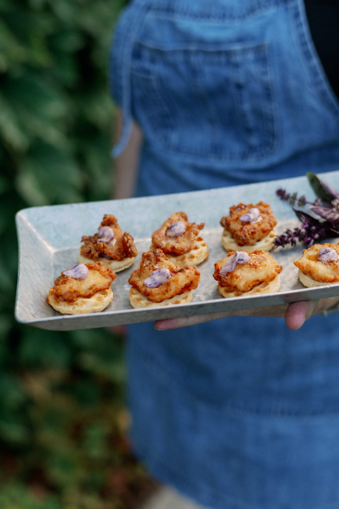 photo of wedding appetizers to discuss when to book a caterer in your timeline for booking wedding vendors