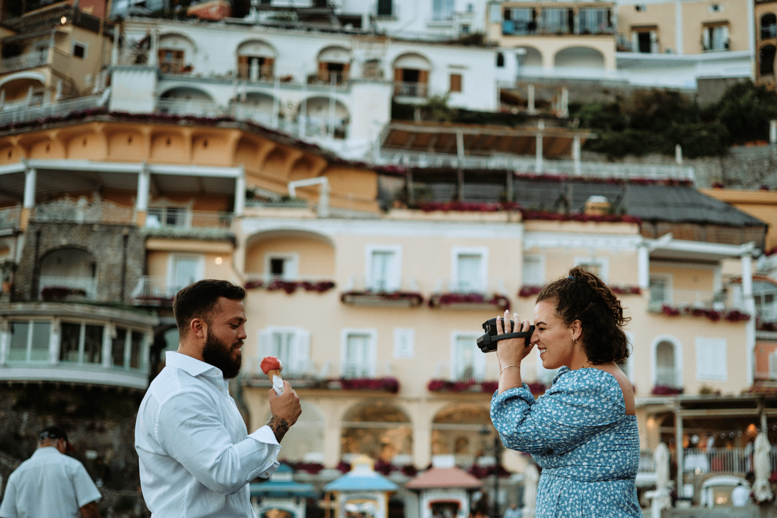 positano engagement photo inspo with gelato and film cameras