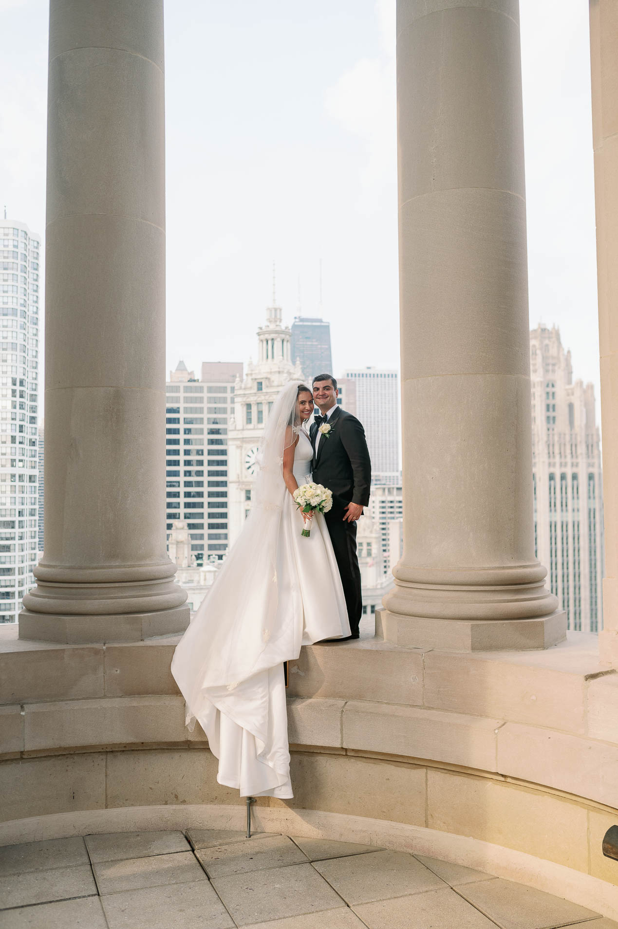 a couple during their bridal portraits on the cupola at london house chicago
