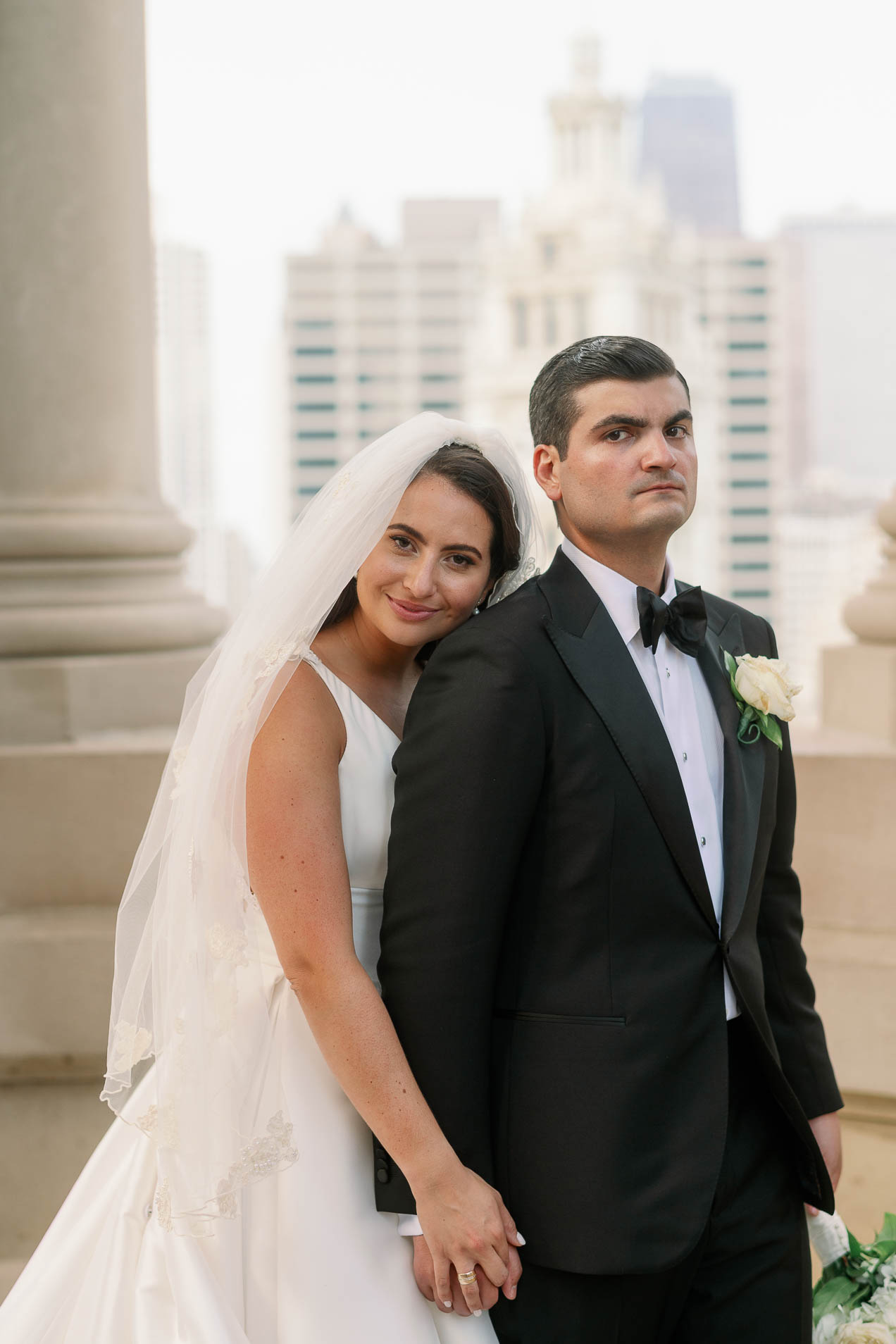 a couple during their bridal portraits on the rooftop at london house chicago