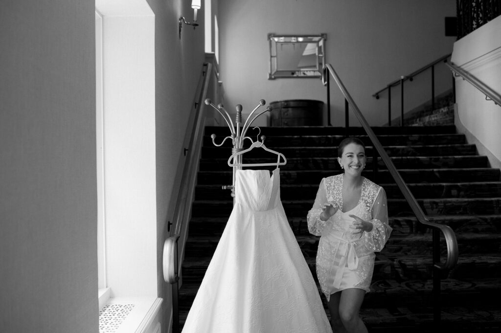a bride getting ready to put on her dress at the intercontinental chicago