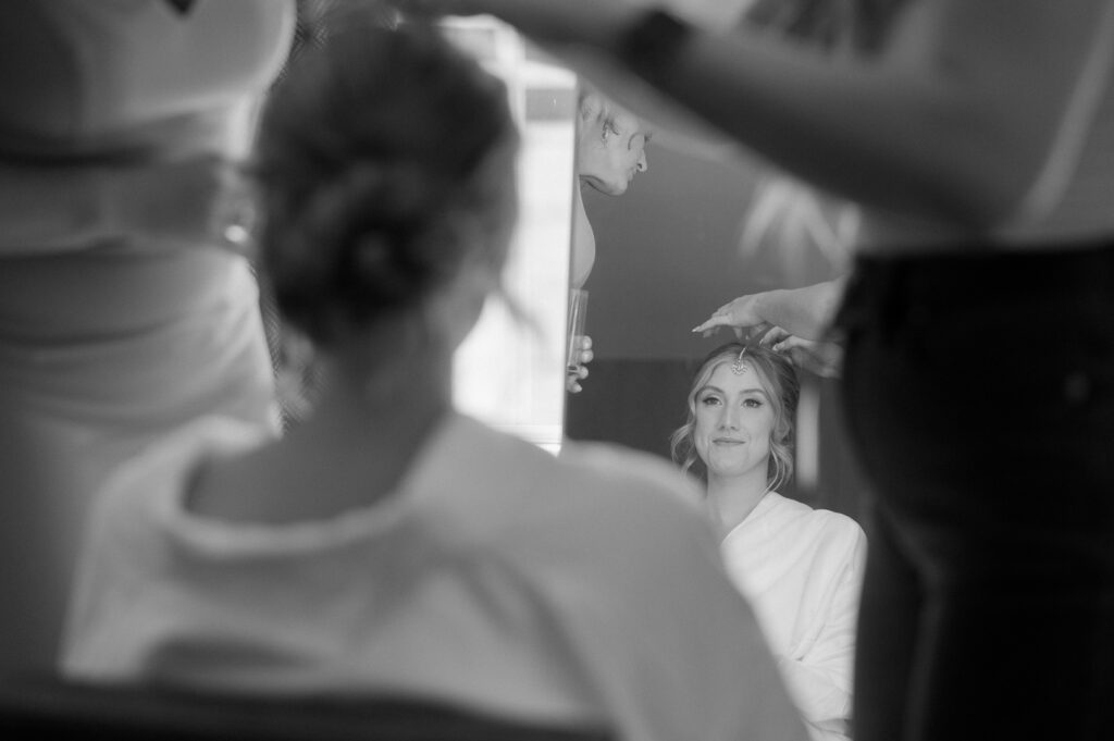 a bride getting ready for her south asian wedding at the westin michigan avenue hotel in chicago illinois