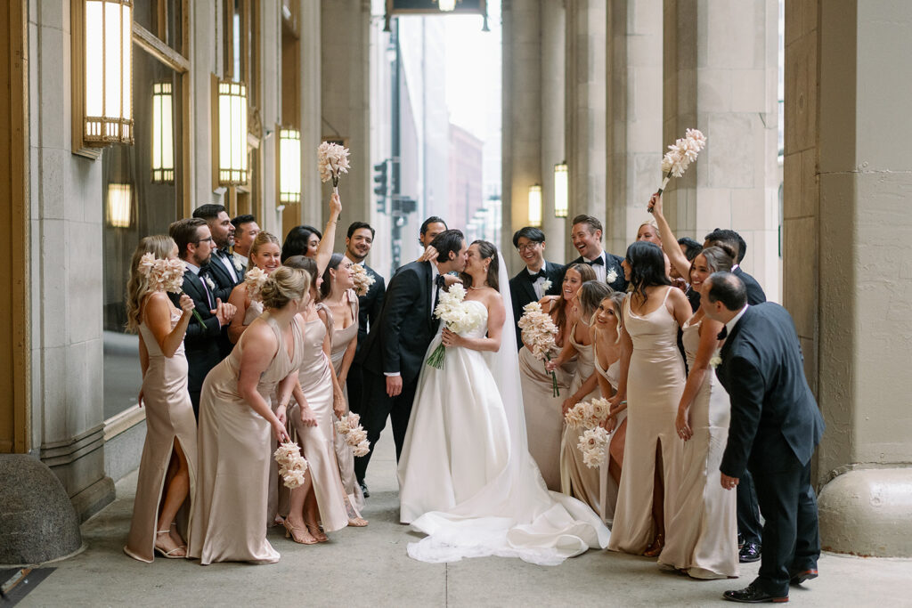 wedding party photo at the civic opera building in chicago, illinois
