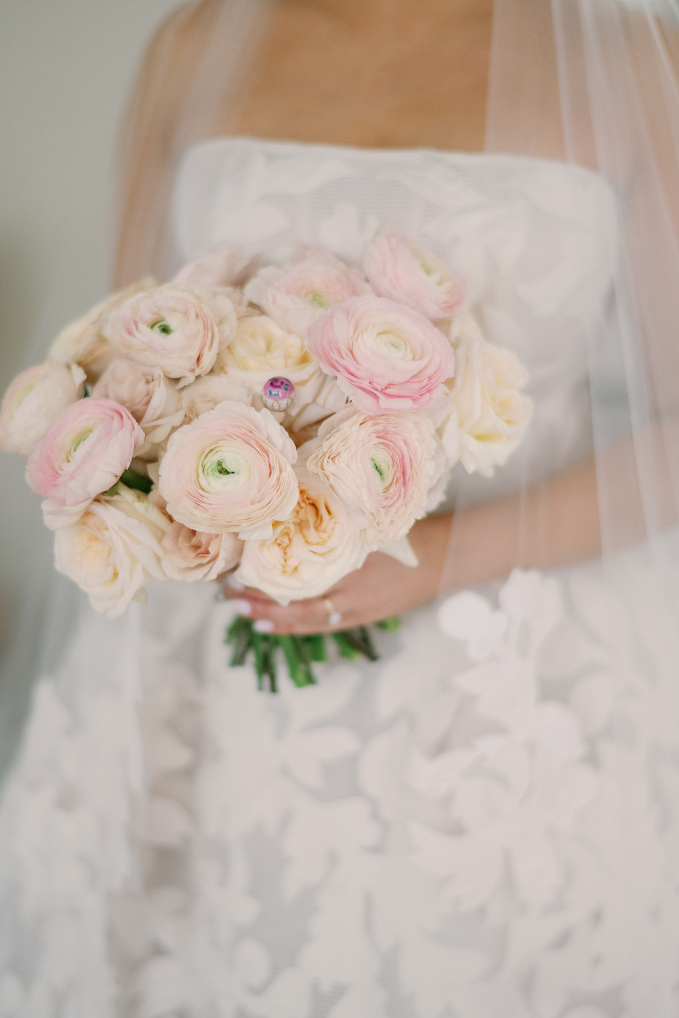 blush ranunculus and rose wedding bouquet 