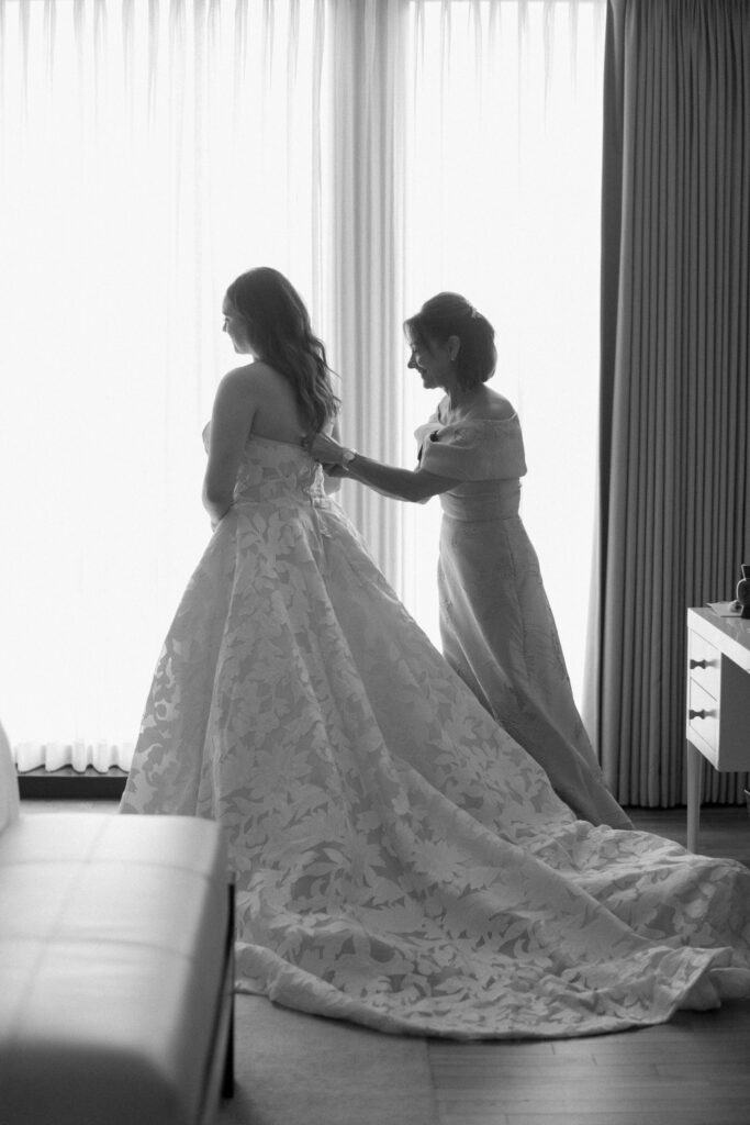 bride getting dressed at the langham chicago